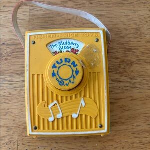 Fisher-Price Vintage Portable Radio Music Box all around the mulberry bush 1964